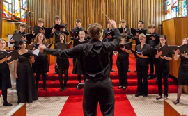 Photograph of the Collegium Musicum preparing for a concert